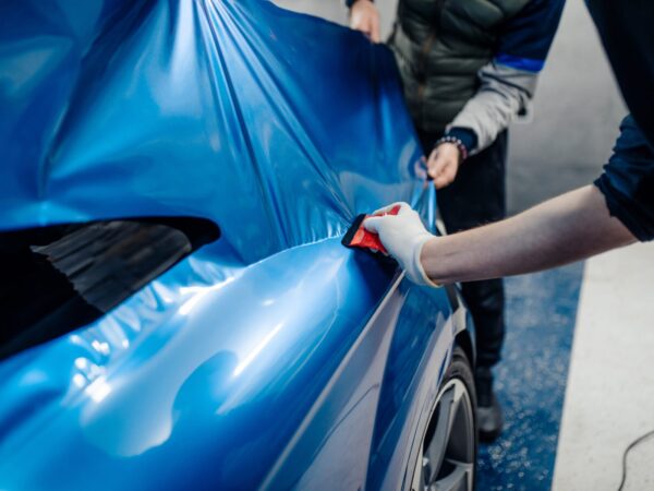Car,Wrapping,Specialists,Putting,Vinyl,Foil,Or,Film,On,Car.